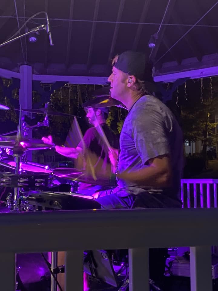 Roadhouse Rhythm and Blues Band performing live at an outdoor concert